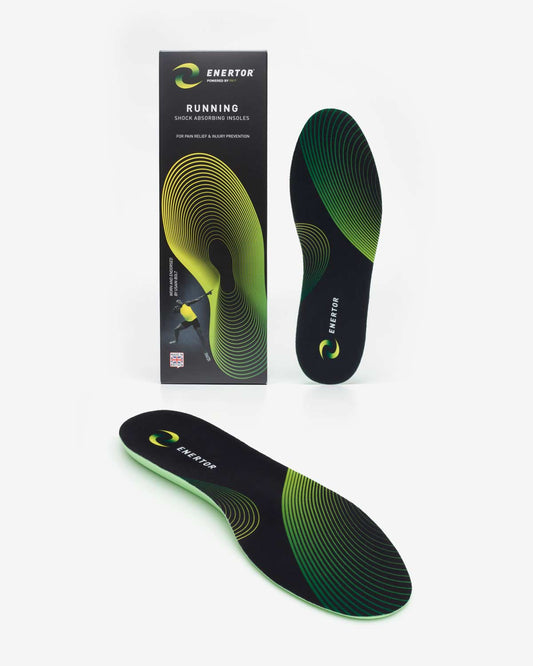 Running insoles in black with neon green trim and contoured cushioning lines