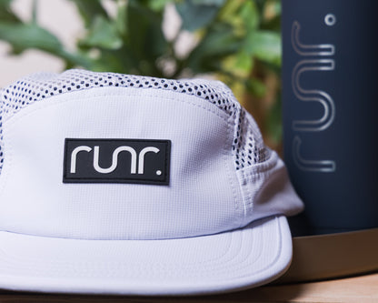 White mesh running hat front panel with black Runr logo patch