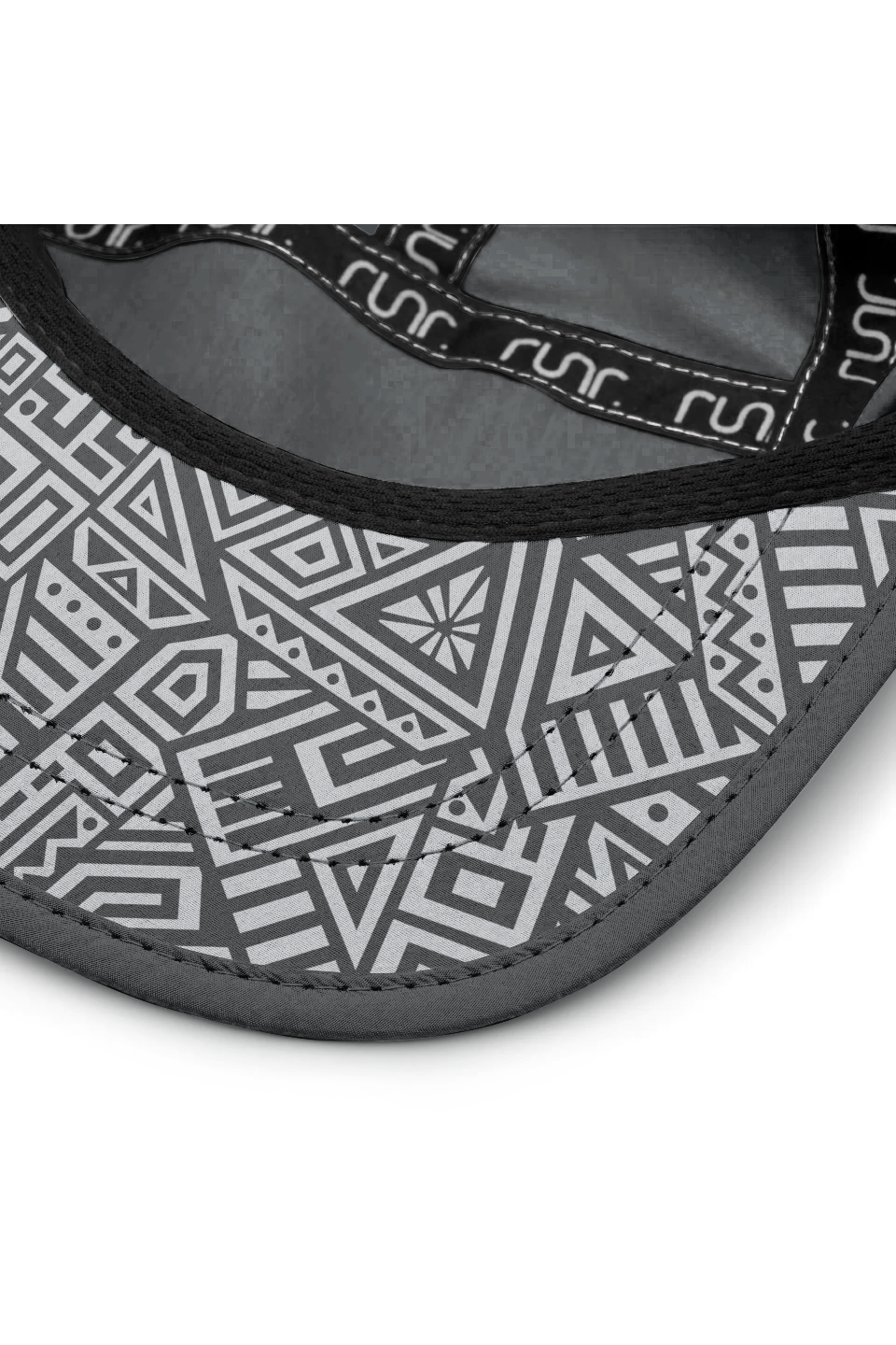 Running hat brim with geometric patterned lining and dark fabric trim