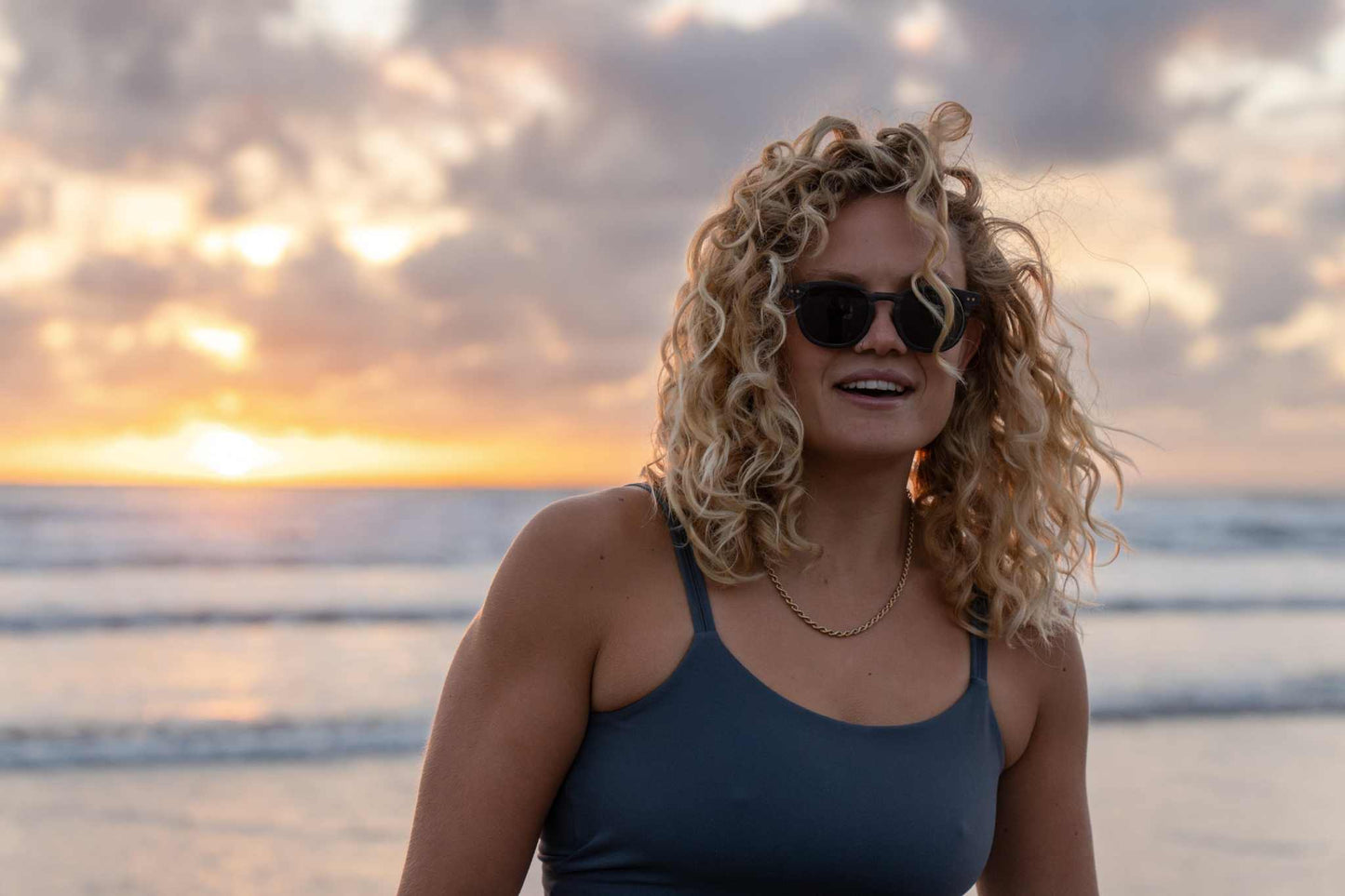 Sunglasses on woman with dark lenses and tortoiseshell frame