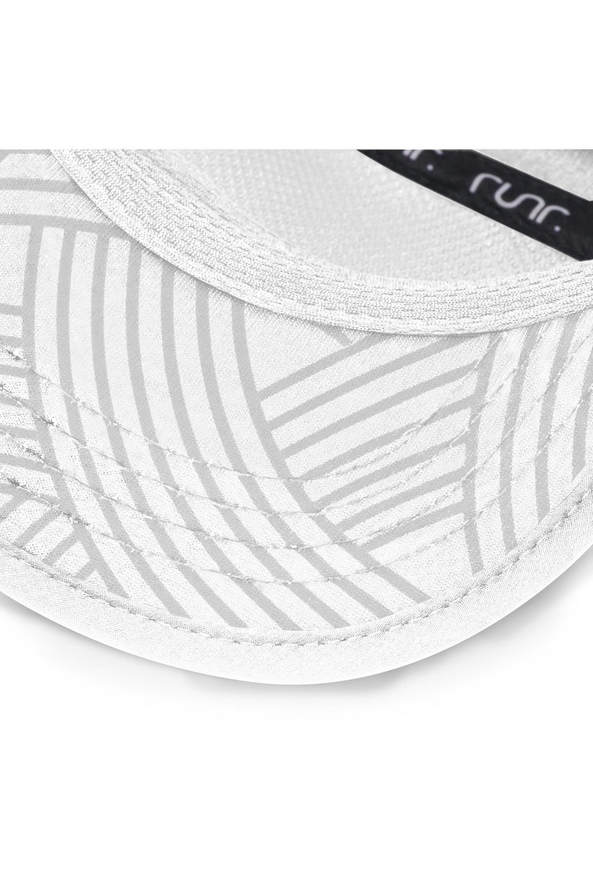 White technical running cap close-up with patterned side ventilation panel