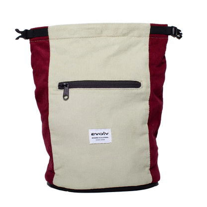 Corduroy chalk bucket in cream and dark red with front zipper pocket and logo patch