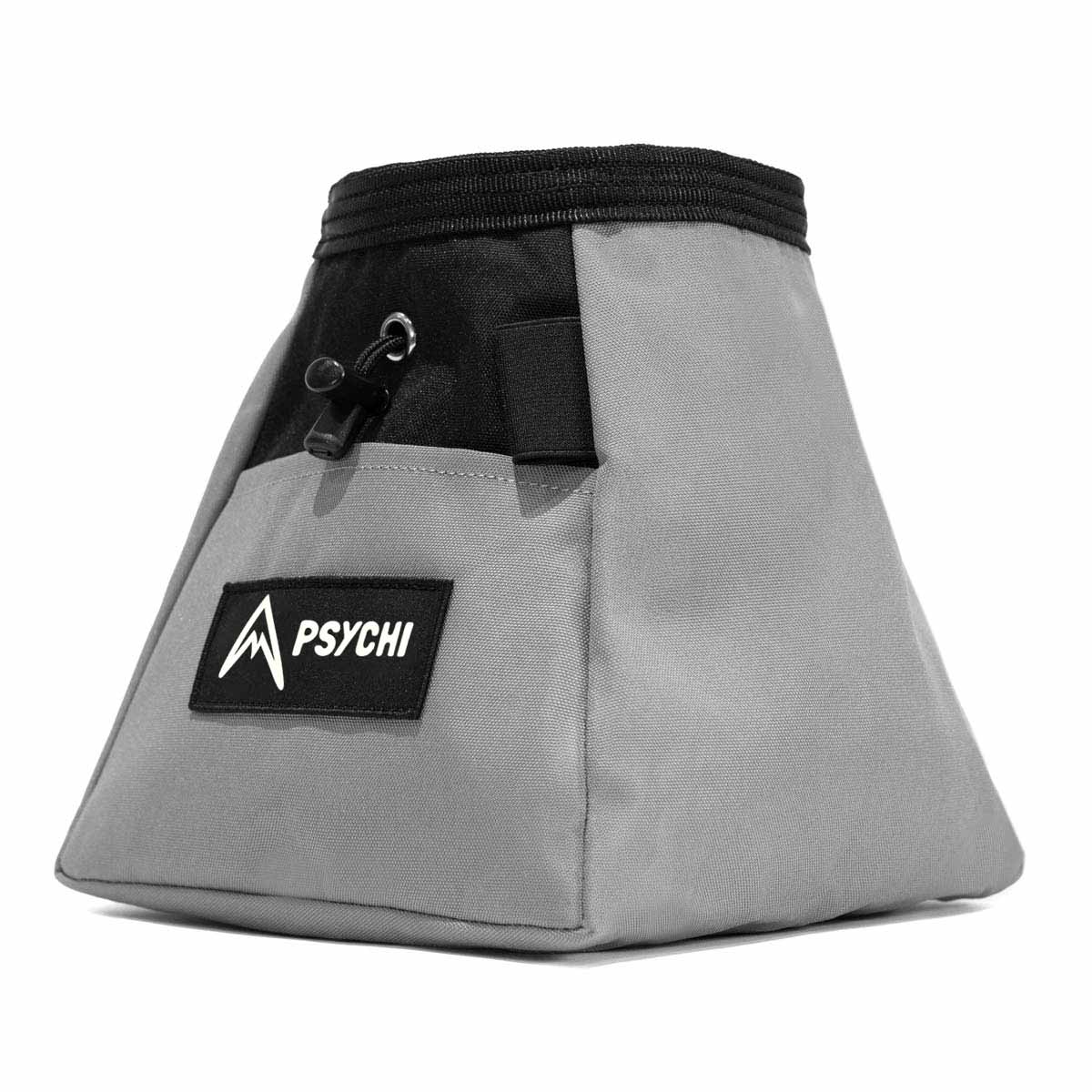 Grey climbing chalk bucket with black top drawstring and PSYCHI logo patch