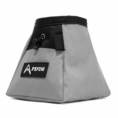 Grey climbing chalk bucket with black top drawstring and PSYCHI logo patch