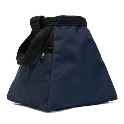 Navy bouldering chalk bucket with black carry strap and drawstring closure