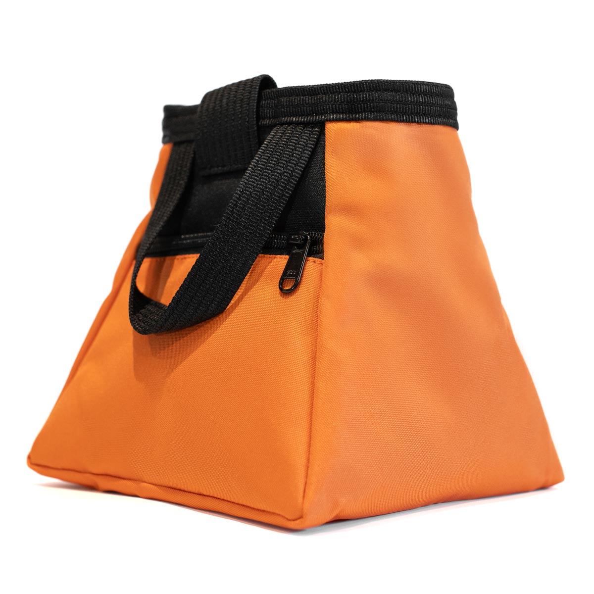 Orange chalk bucket angled view with black strap and drawstring closure