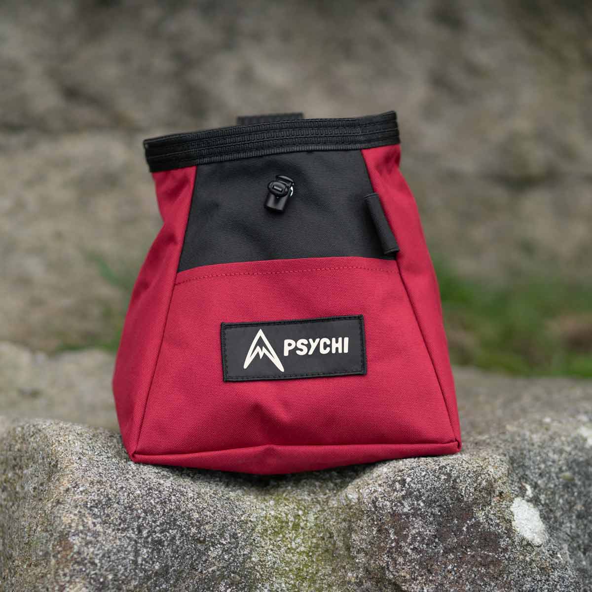 Red and black chalk bucket with PSYCHI logo label