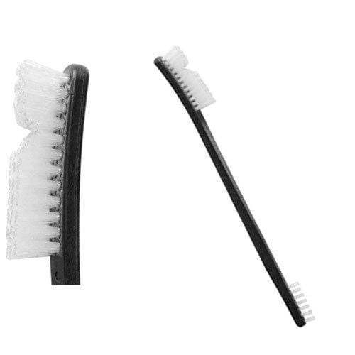 Black dual-sided rock climbing brush with stiff bristle heads on a curved handle