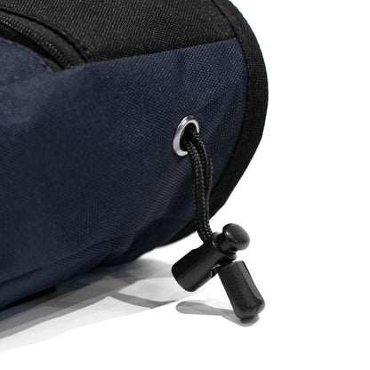 Navy climbing chalk bag with drawstring closure and black carabiner clip loop