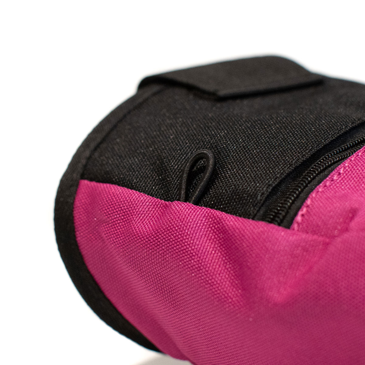 Magenta climbing chalk bag with black trim and side loop for hanging or clipping