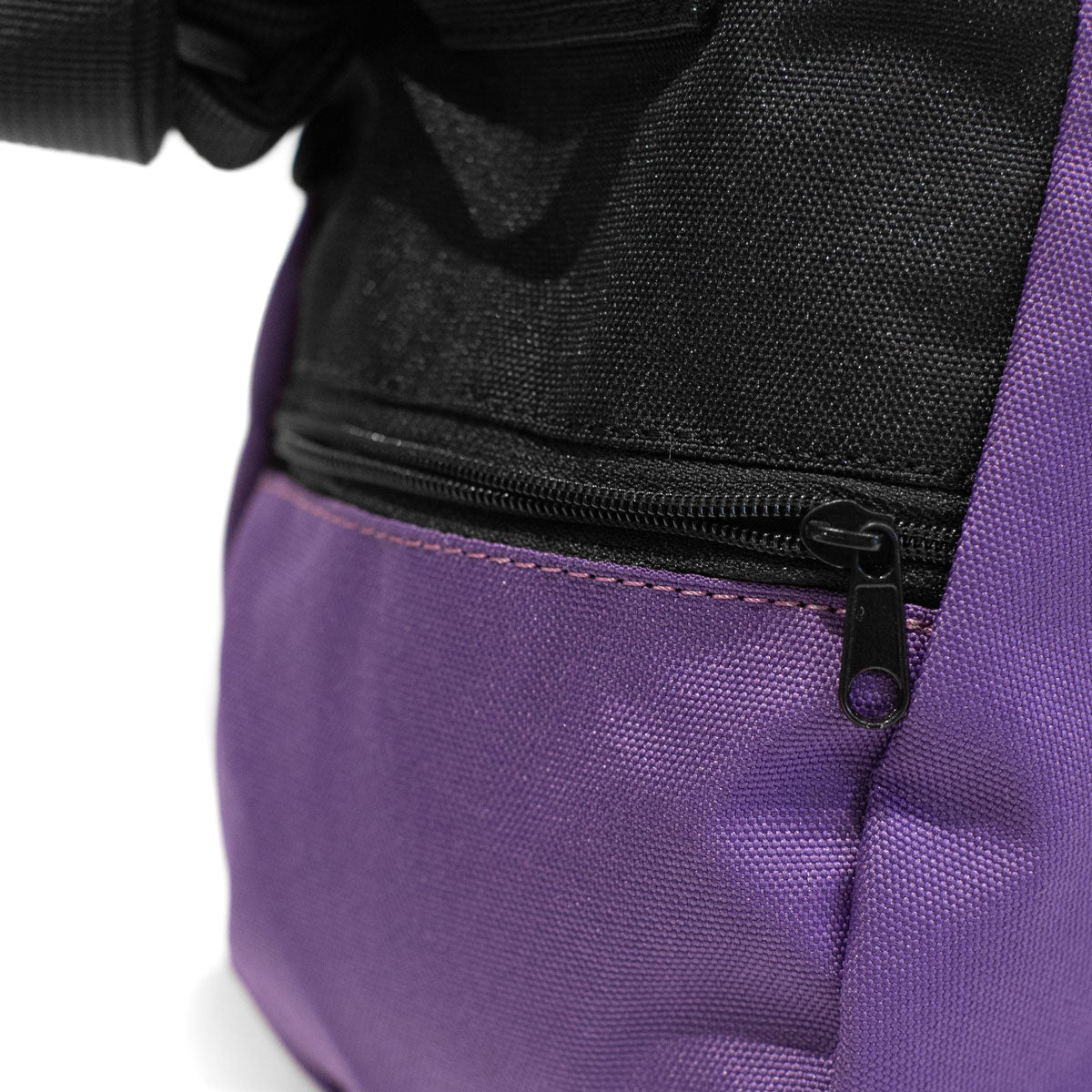 Purple climbing chalk bag with black zipper pocket and stitched side seam