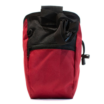 Dark red climbing chalk bag with black webbing straps and zip pocket