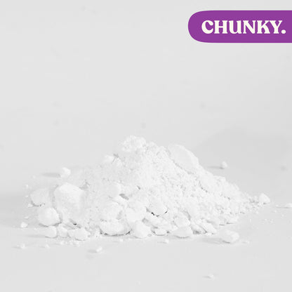 Chunky white climbing chalk powder heap