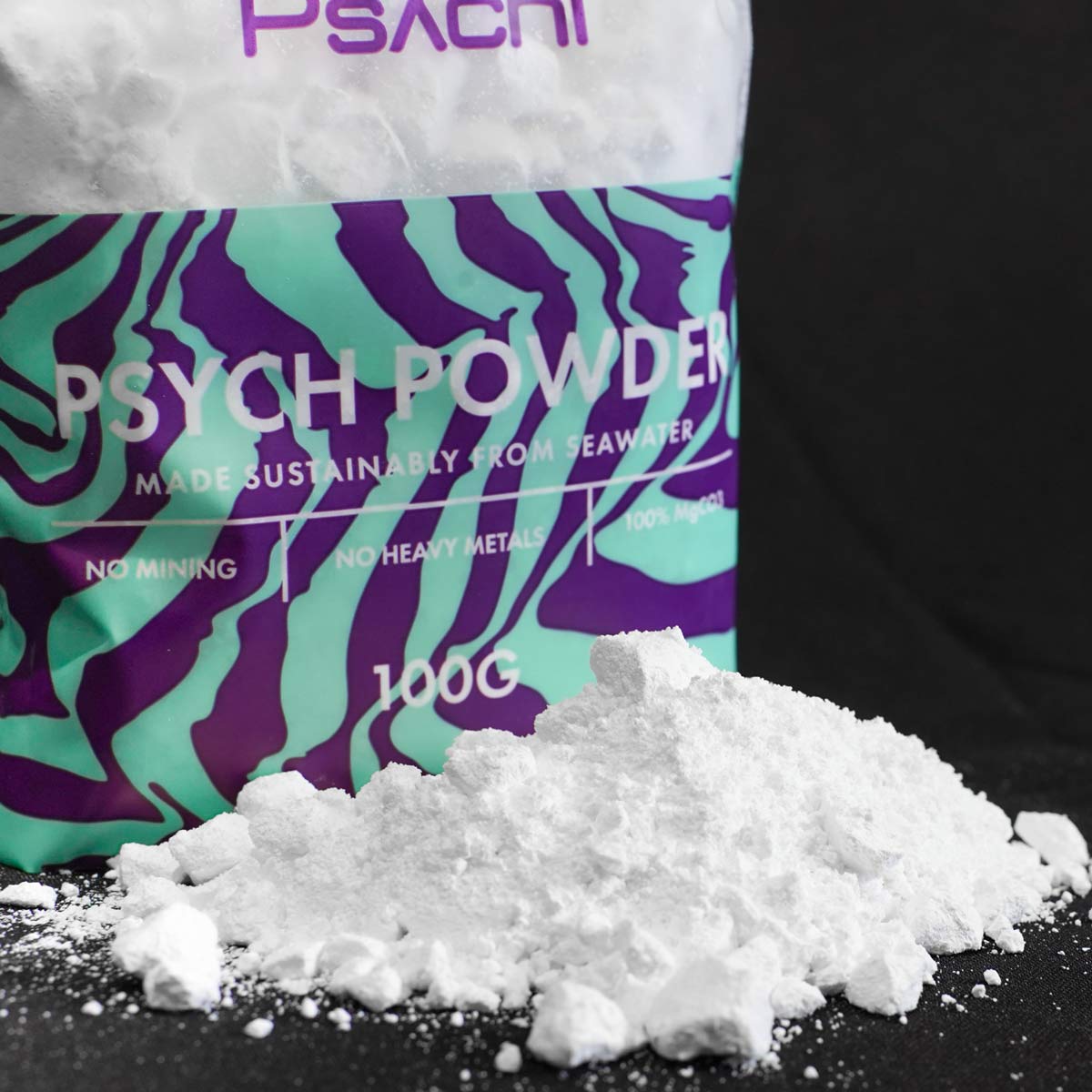 Psychi climbing chalk powder, loose white powder pile