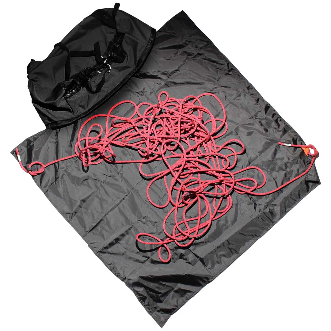 Grey climbing rope bag with pink rope and black carrying straps