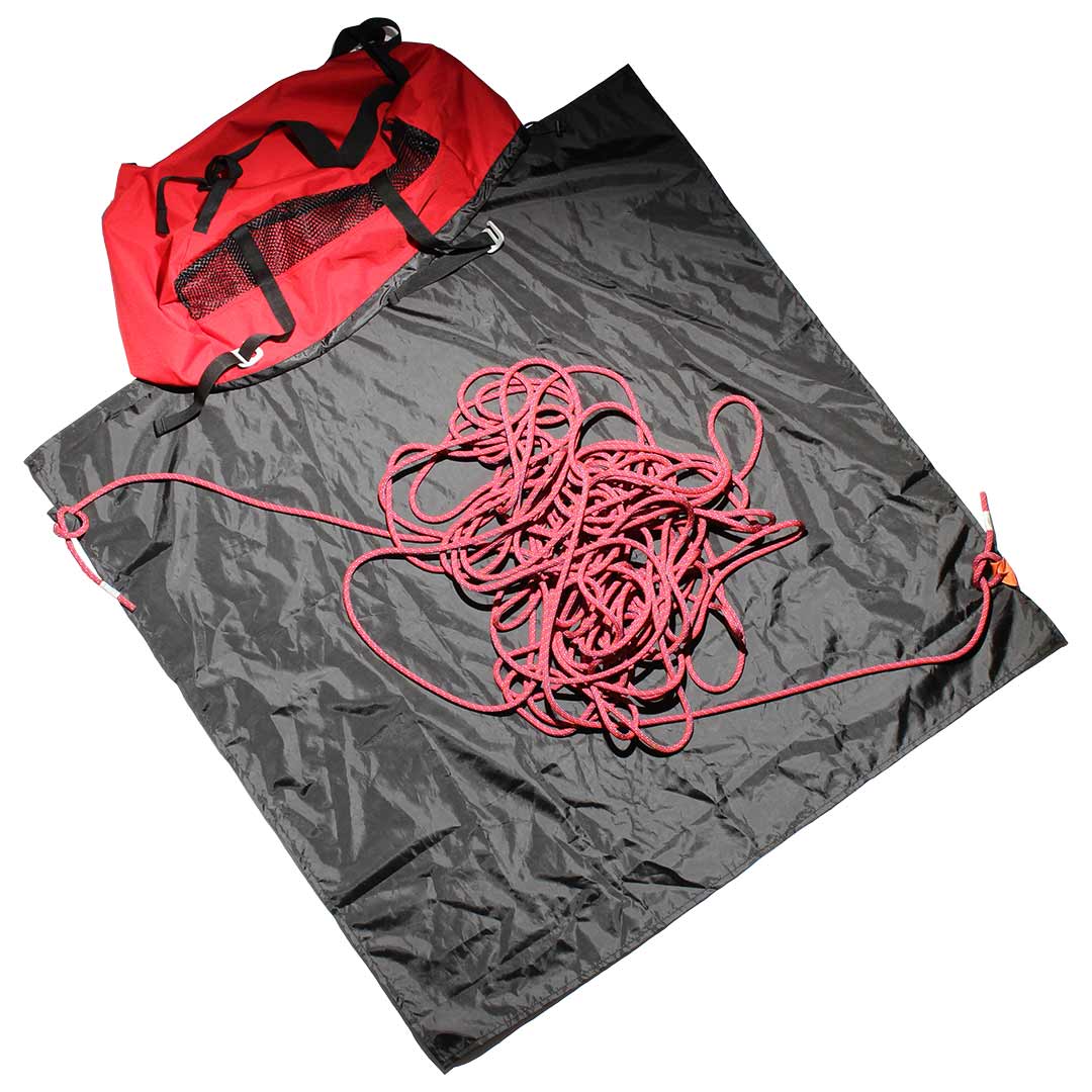 Climbing rope bag, grey with black straps and drawcord, with pink rope inside