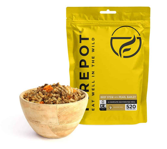 Dehydrated beef stew with pearl barley pouch and bowl of chunky stew