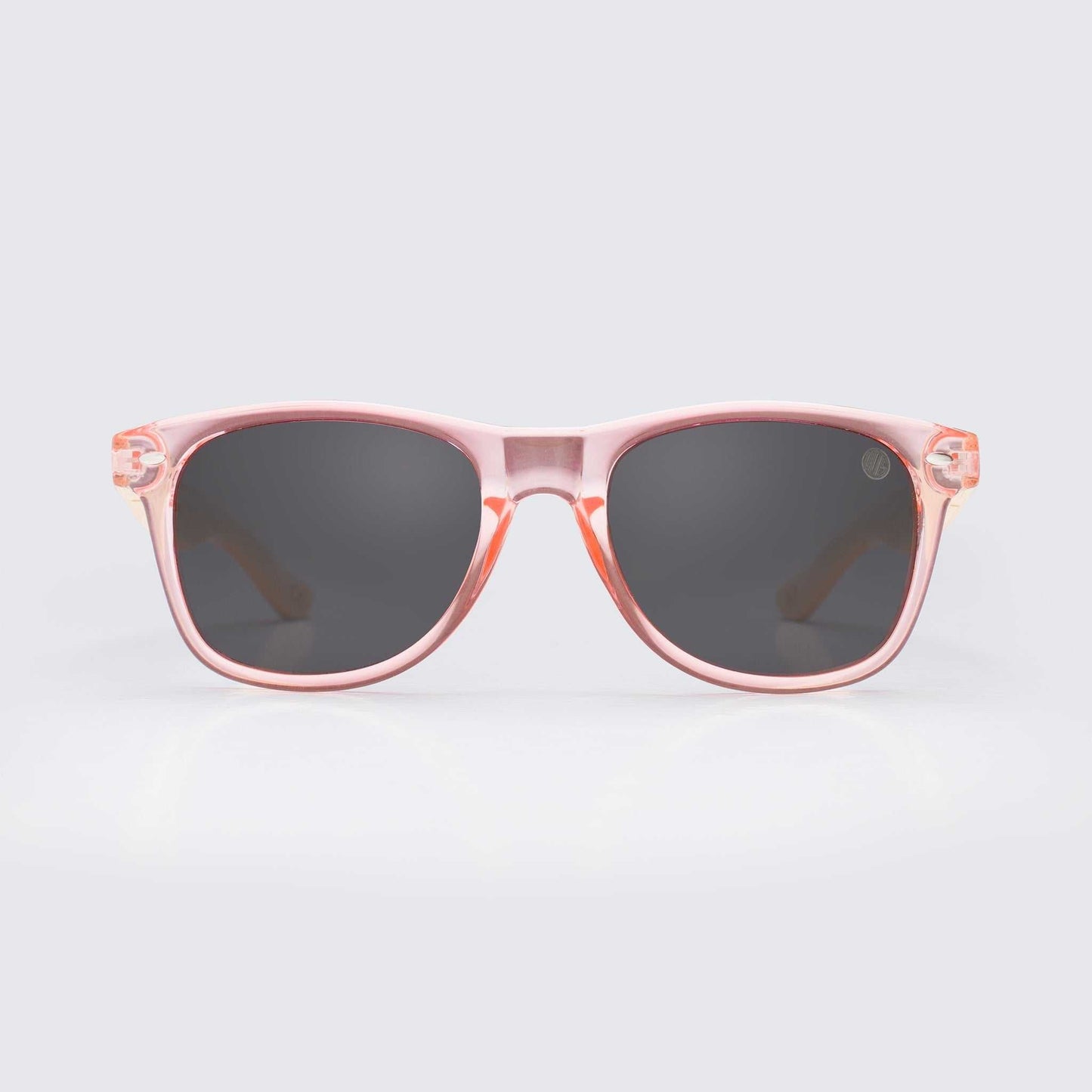 Light pink square sunglasses with dark lenses