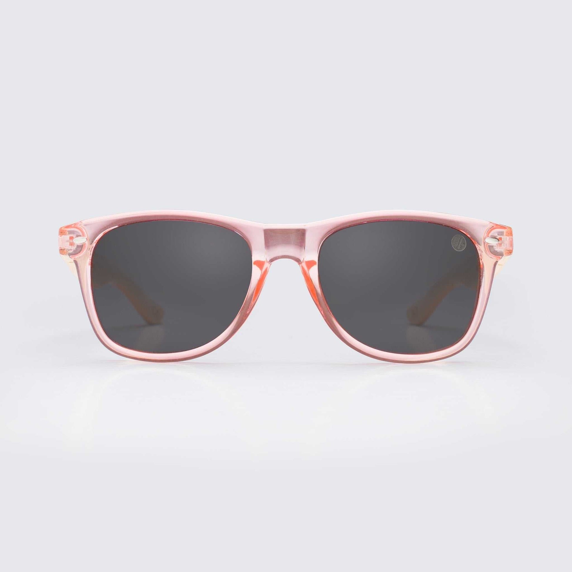 Light pink square sunglasses with dark lenses