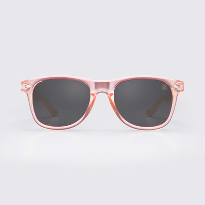 Light pink square sunglasses with dark lenses