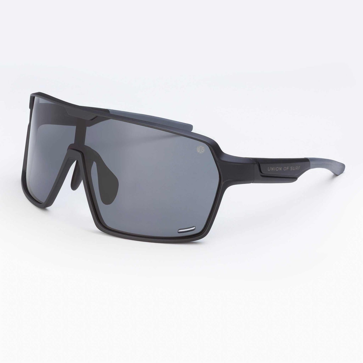 Black wraparound sport sunglasses with dark gray lenses, angled side profile