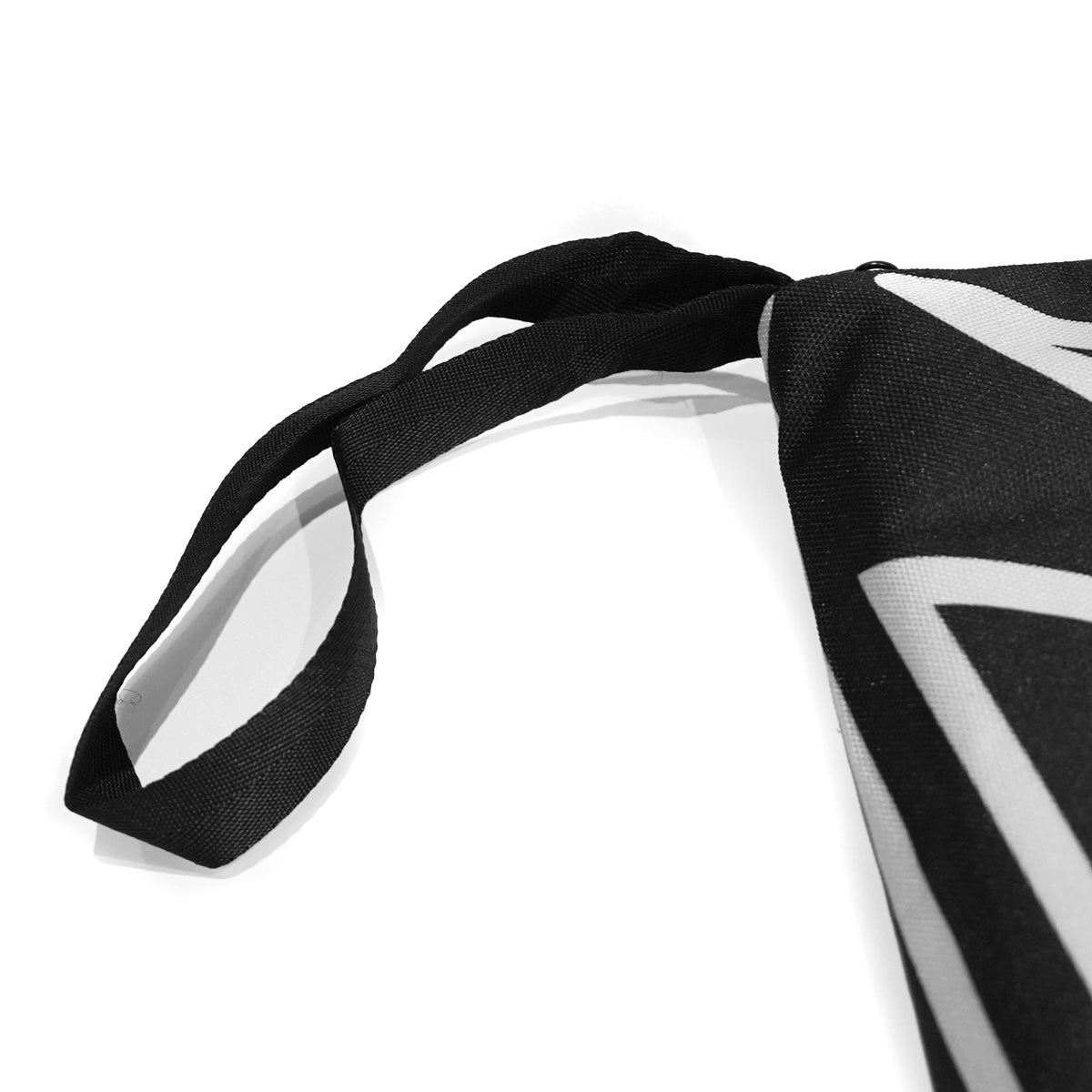Weatherproof climbing guidebook cover with black strap and bold white/black graphic panel