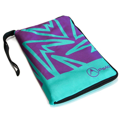 Weatherproof climbing guidebook cover with purple-and-teal graphic, teal-blue base, black trim