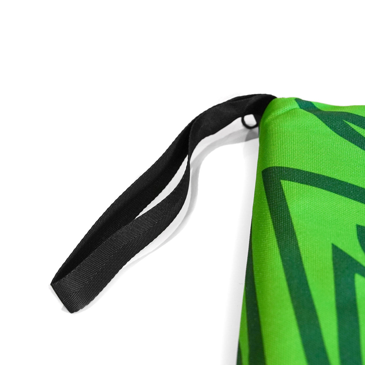 Weatherproof climbing guidebook cover with green tones, teal graphic, and black carry strap
