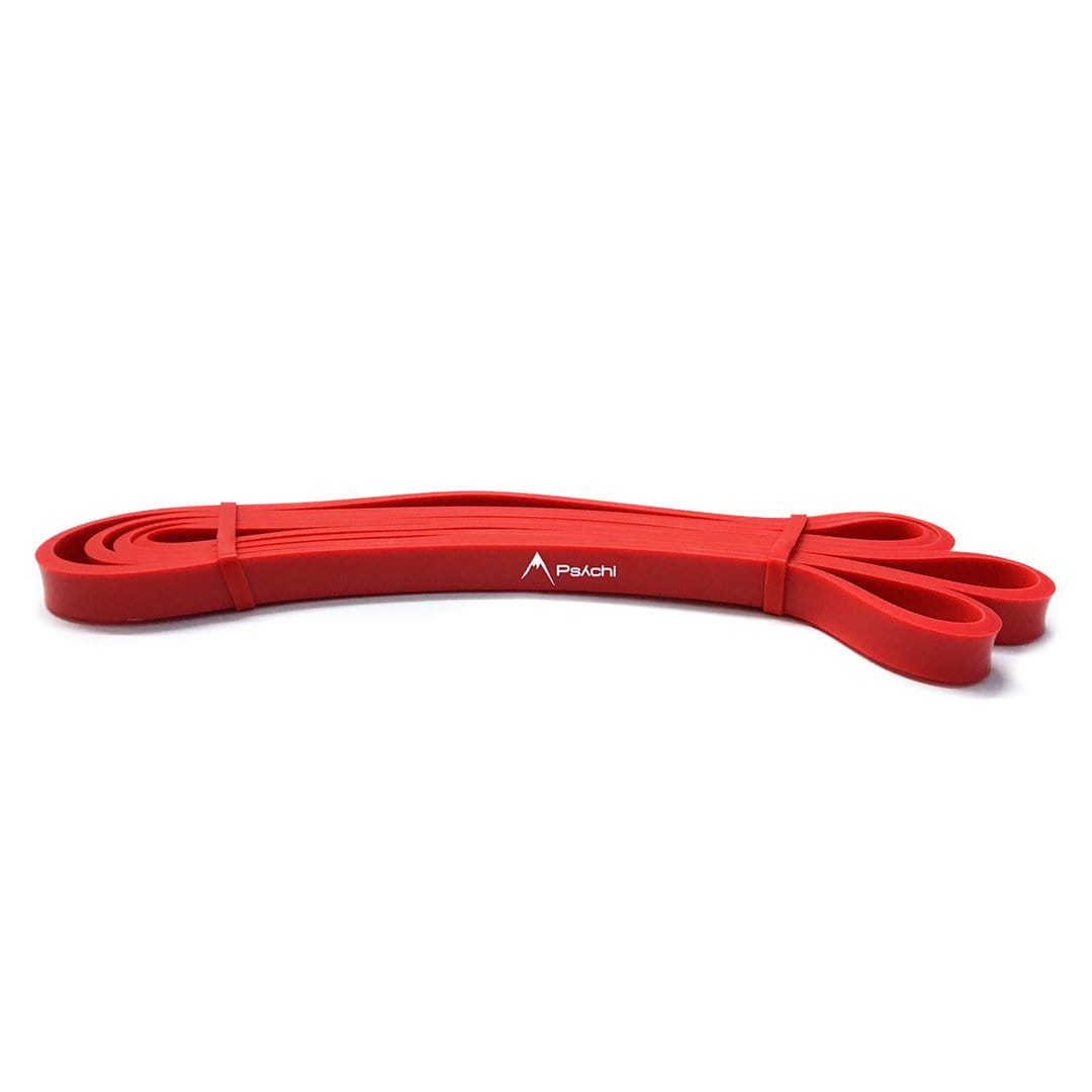 Red resistance band loop secured with a mid-band fold and Psachi logo