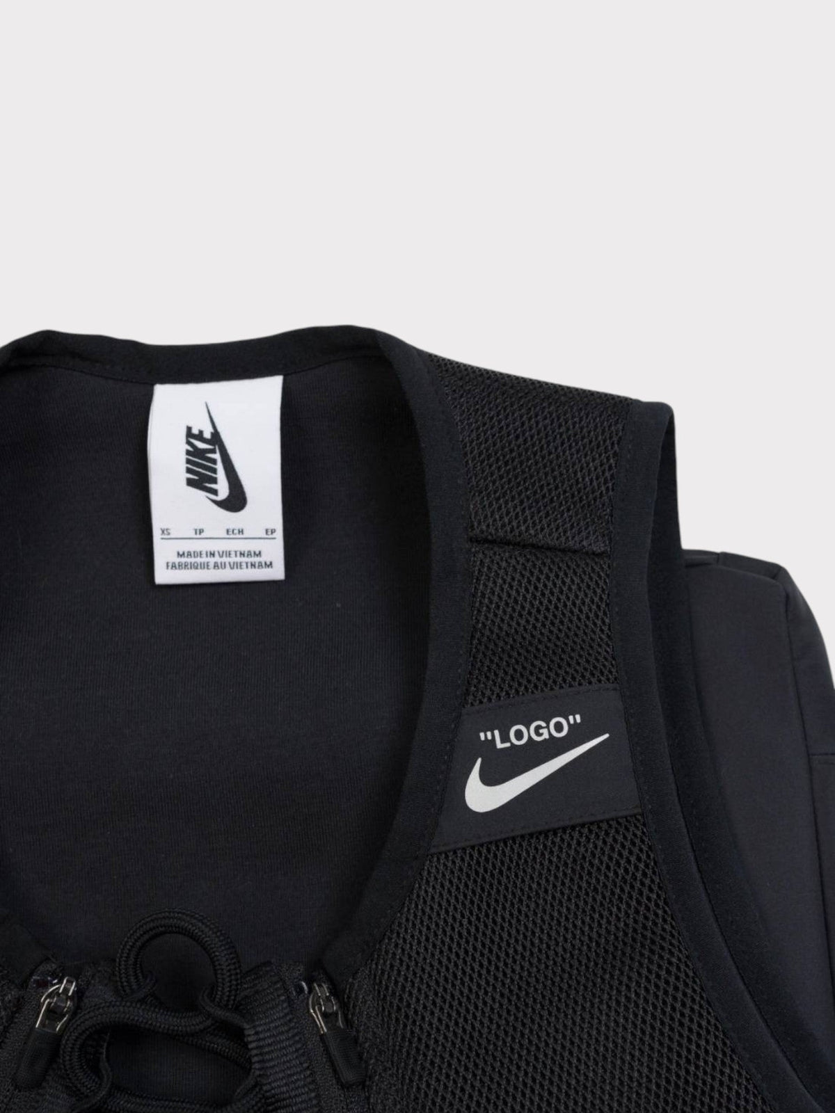 Nike bib vest with mesh side panels and swoosh logo label on chest