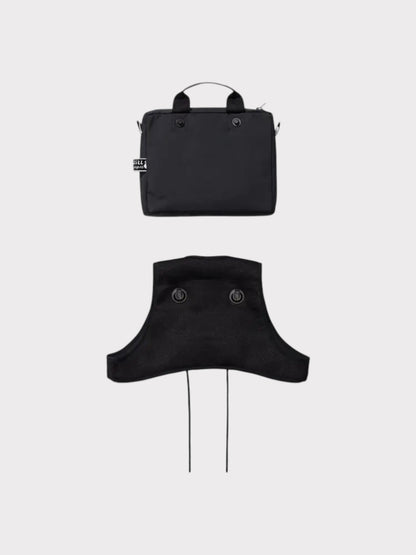 Black Nike cross bib with wide neck opening and two hanging drawcords