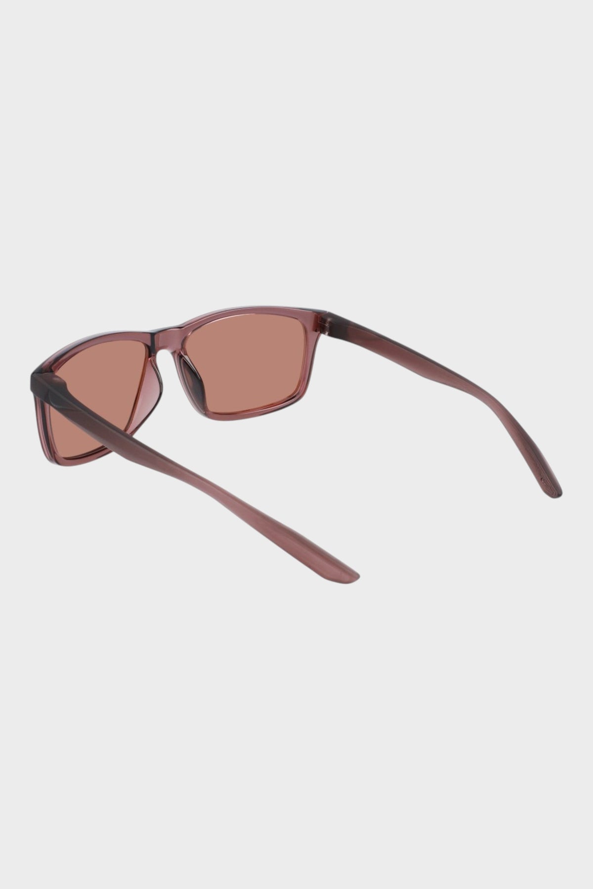 Nike sunglasses top view, mauve frame with copper-tinted lenses and nose bridge