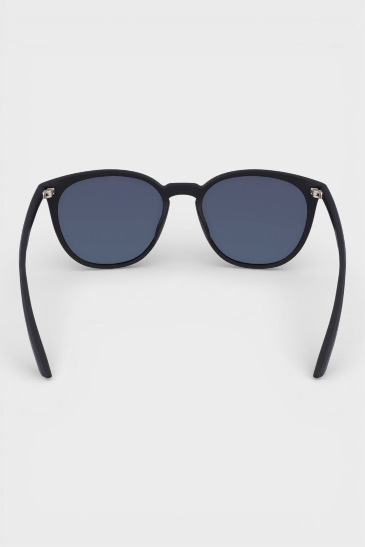 Nike matte black sunglasses with dark grey lenses, front close-up