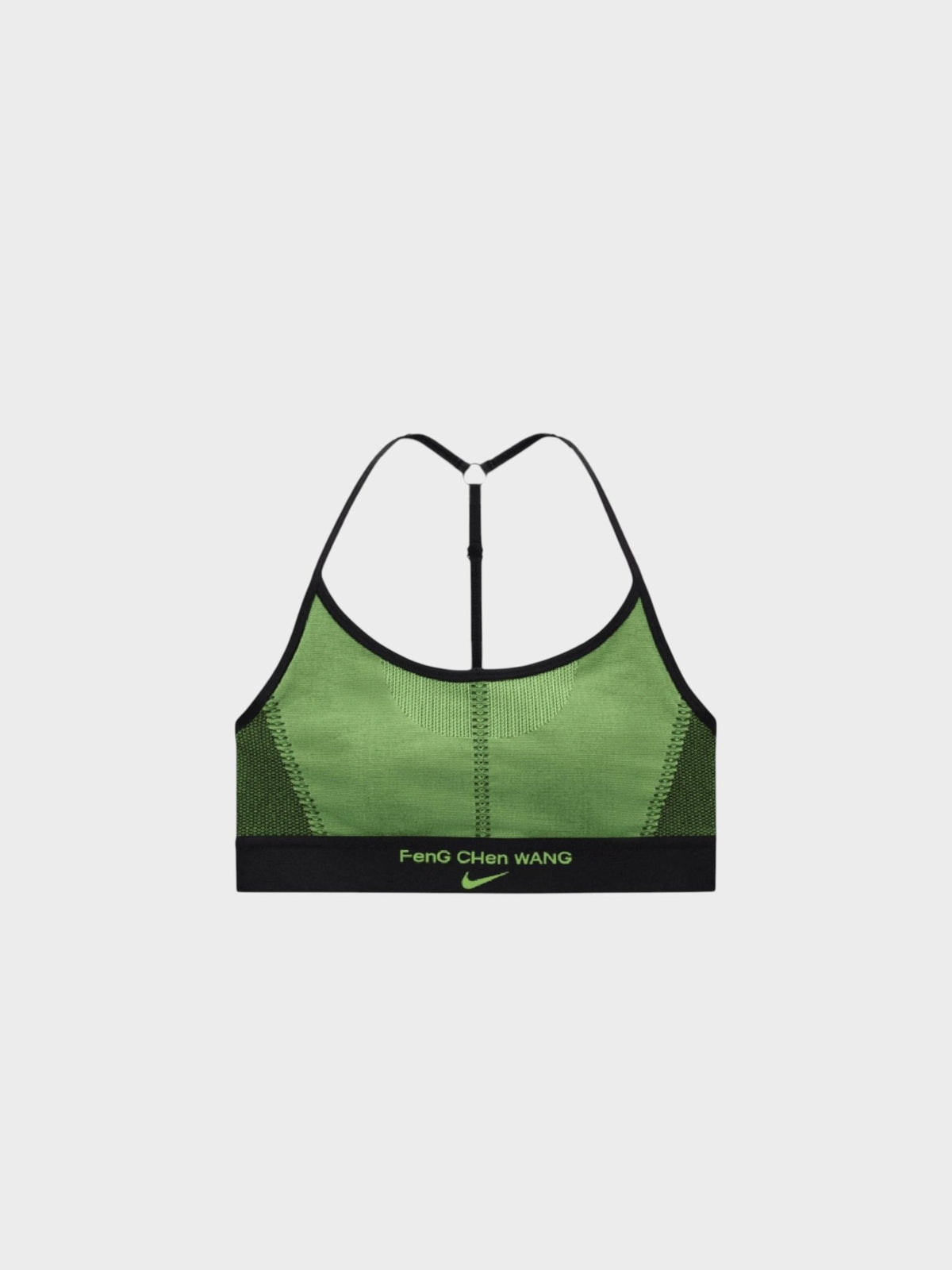 Green sports bra with black elastic trim and racerback straps, center back seam