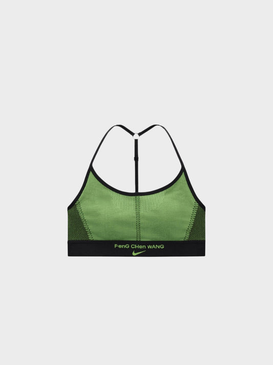 Green sports bra with black elastic trim and racerback straps, center back seam