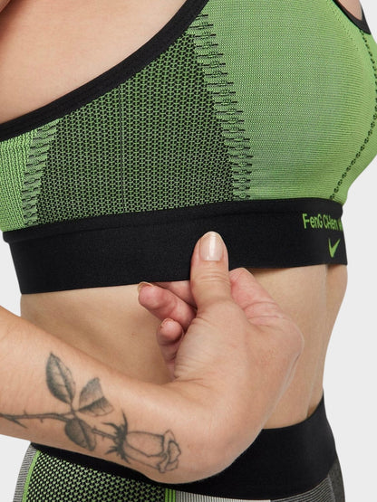 Green sports bra band with black elastic and small logo on side