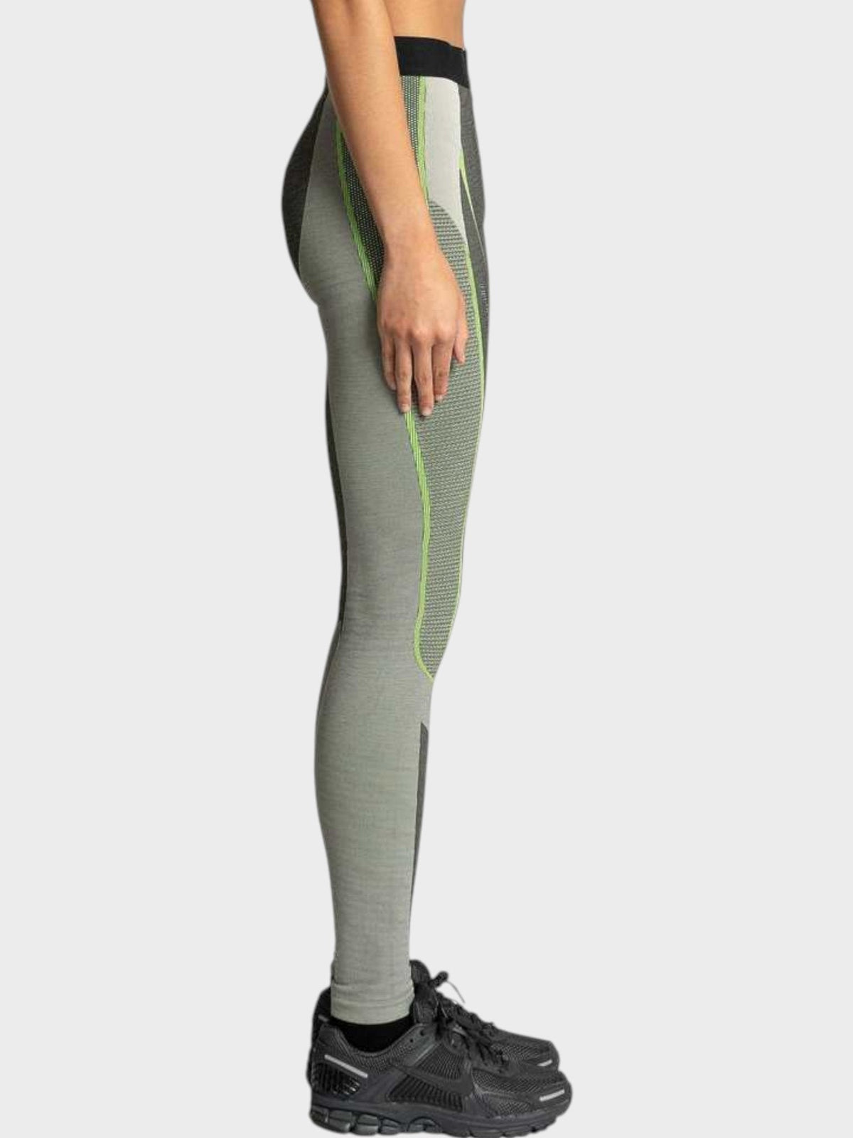 Women’s pro leggings, slim fit dark gray with neon green vertical stripe details