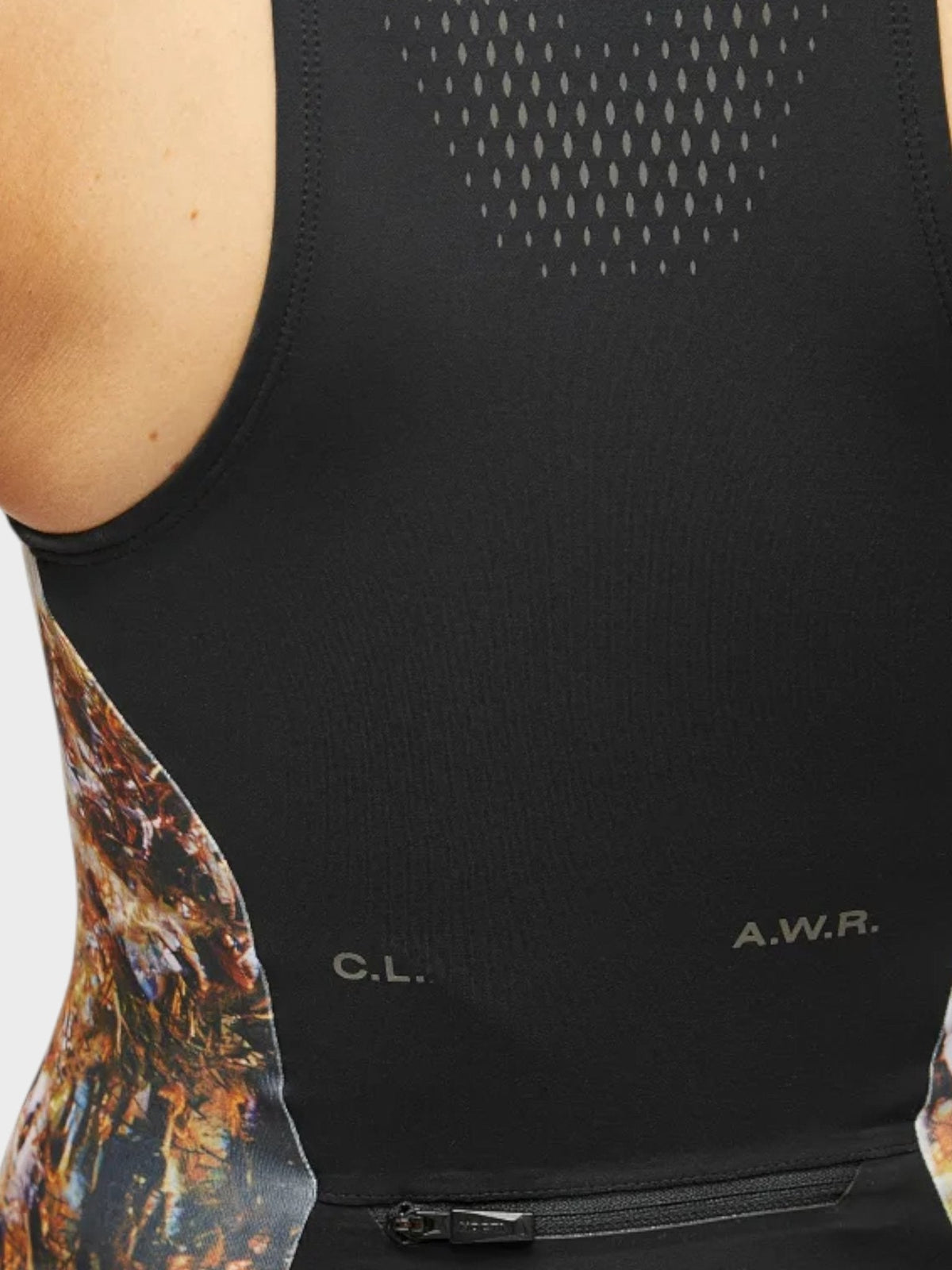 Women's black leotard back with perforated logo detail and zip pocket at waist.