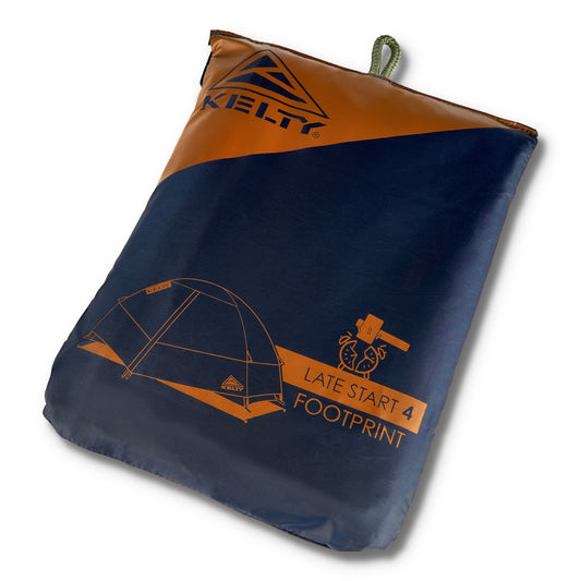 Kelty Late Start 4 person tent footprint tarp in dark blue with orange logo and tie tabs