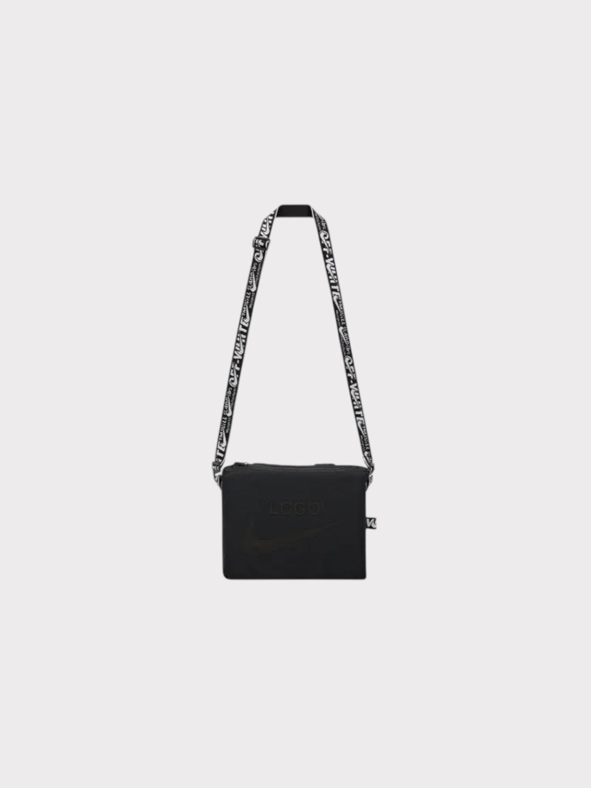 Black Nike crossbody bib bag with patterned shoulder strap and small front pocket