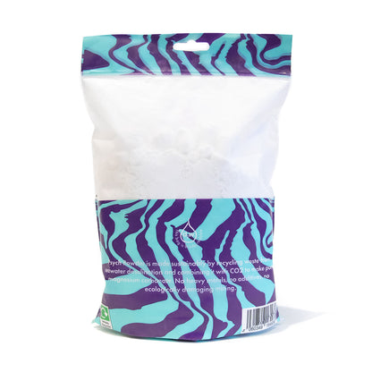 Climbing chalk powder bag with purple/teal pattern, sealed white powder pack