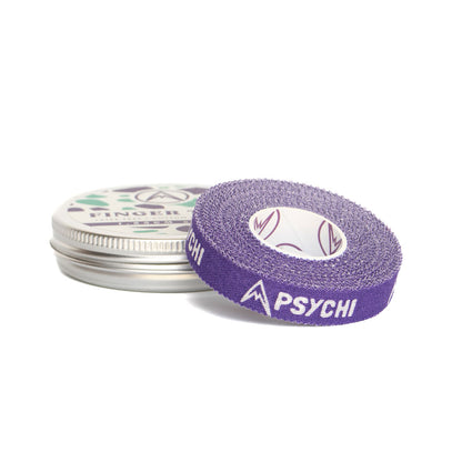 Purple PSYCHI finger tape roll beside metal tin; tape label visible on roll edge.