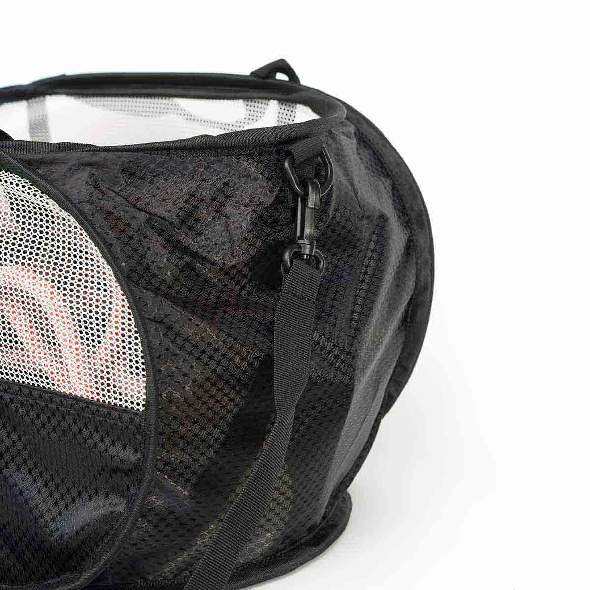 Black rope bag with gray mesh panel and side zipper pocket, close-up
