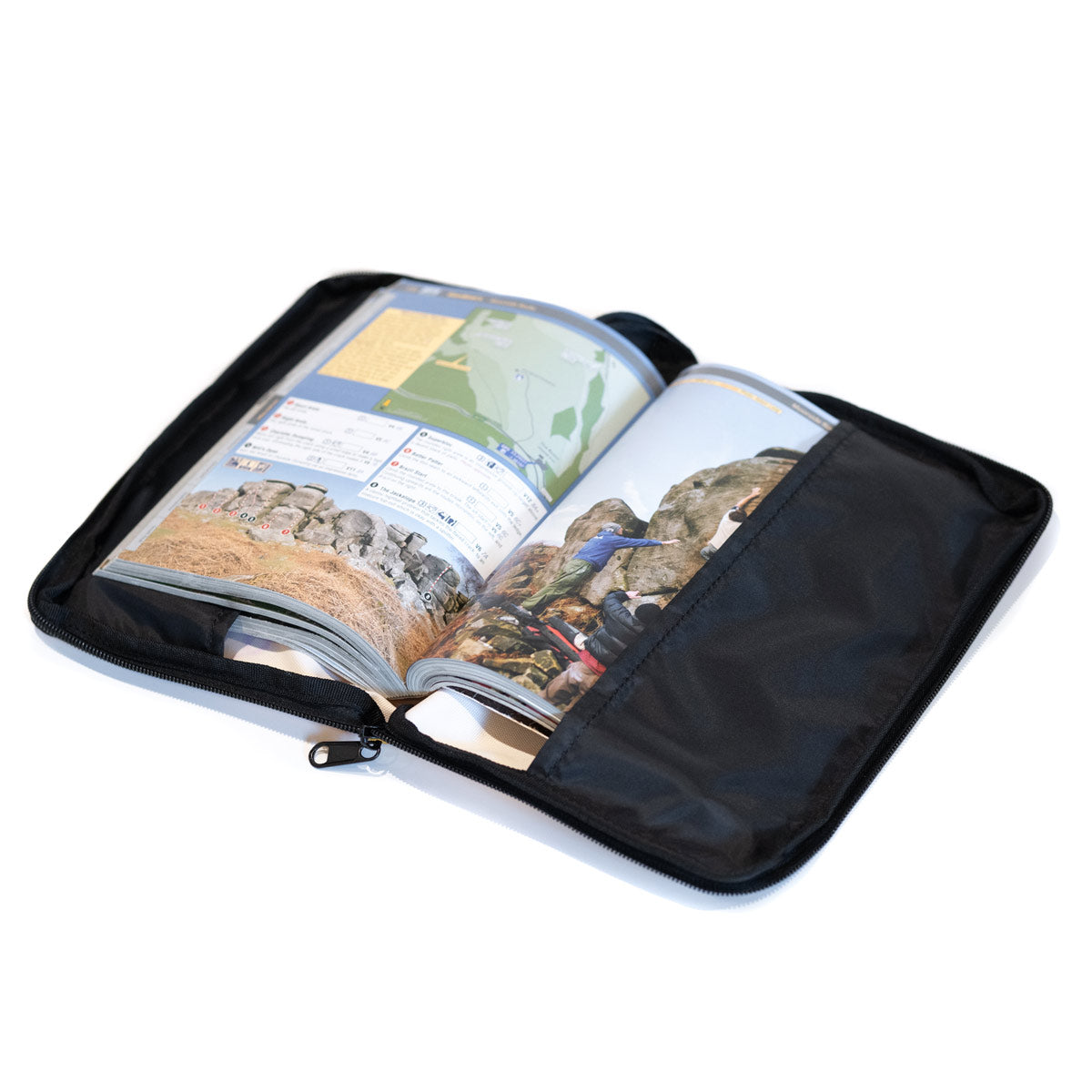 Weatherproof climbing guidebook cover open with two map pages visible, black exterior