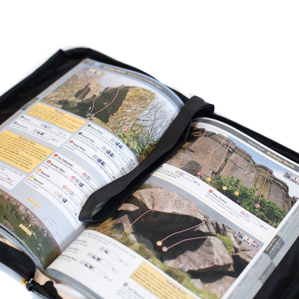 Opened weatherproof climbing guidebook cover showing map pages in black outer sleeve
