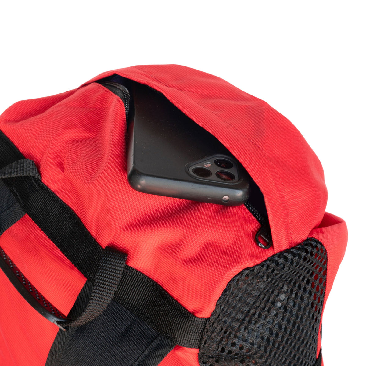 Red climbing rope bag with black straps and front pocket