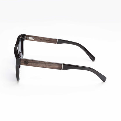 Side view black sunglasses with dark lenses and wood-look temple arms