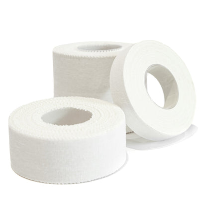 Two rolls of white climbing finger tape with visible hollow center