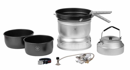 Compact camping gas stove with nested pots, burner head, and accessories