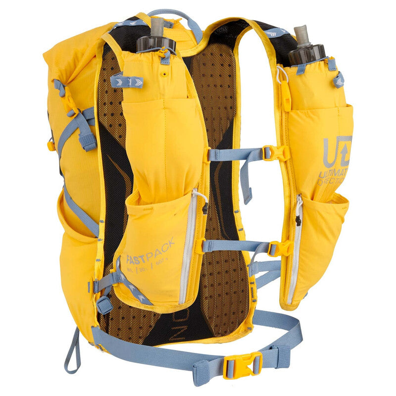 Yellow Ultimate Direction hydration backpack with water bottles on a white background